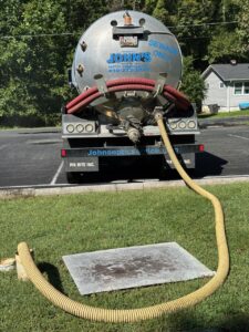 Septic tank pumping truck on site